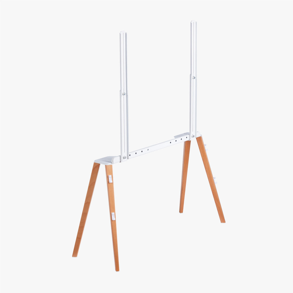 Beech EASEL TV stand seen diagonally from the back, white steel rails and beech legs