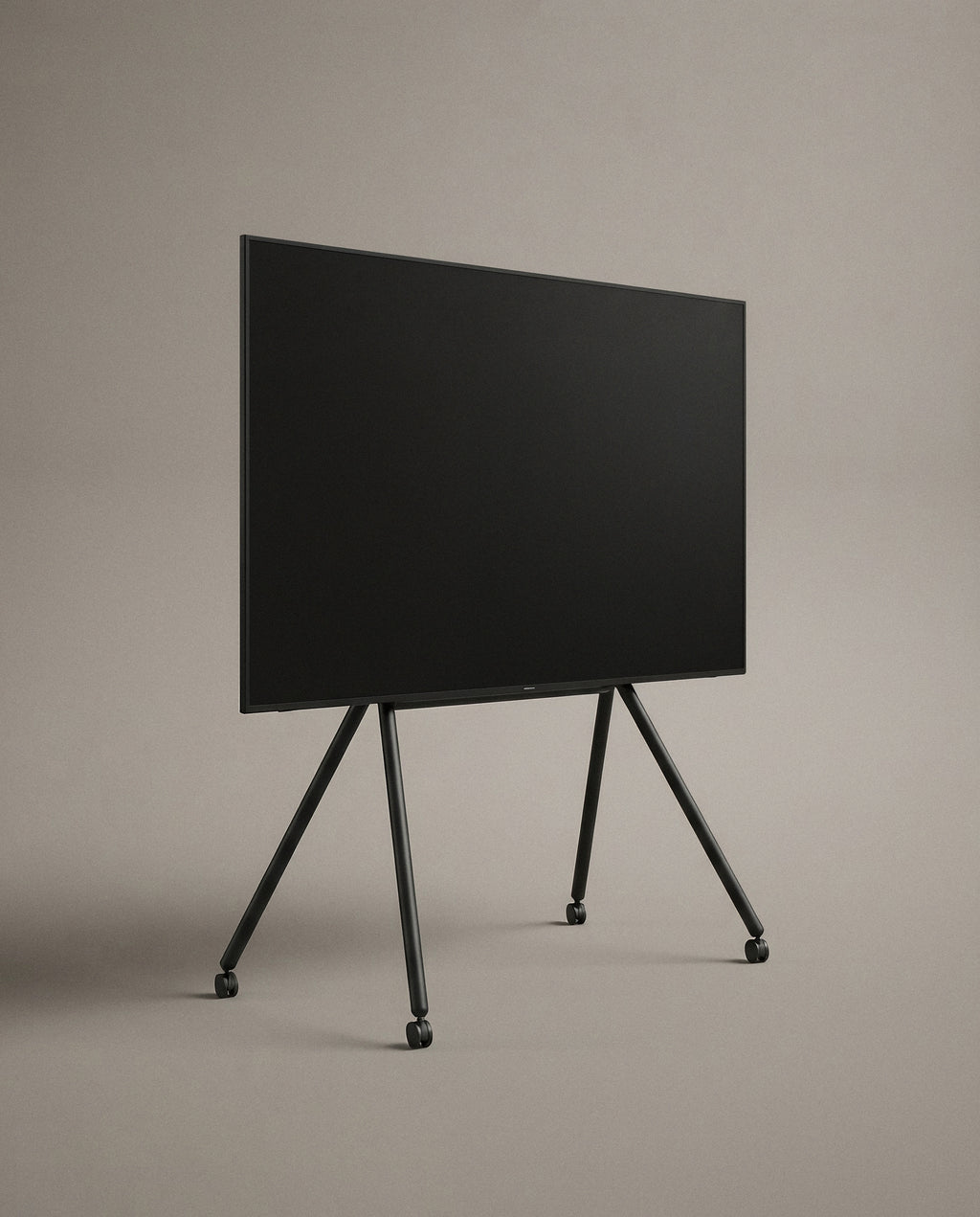 Black Studio TV Stand at a three-quarter angle against a plain studio backdrop