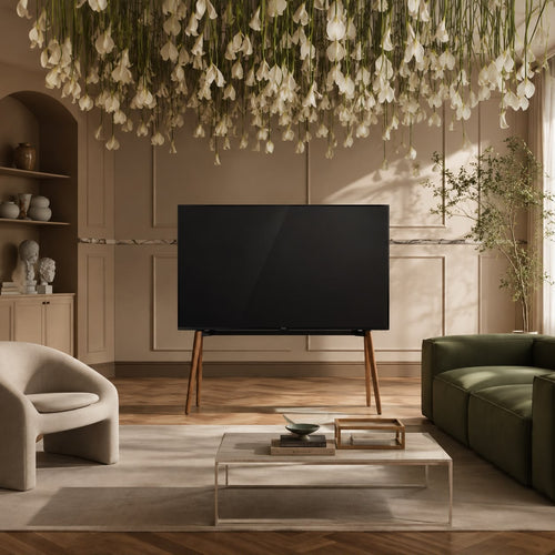 Walnut EASEL TV stand in a paneled salon, solid walnut on painted black steel